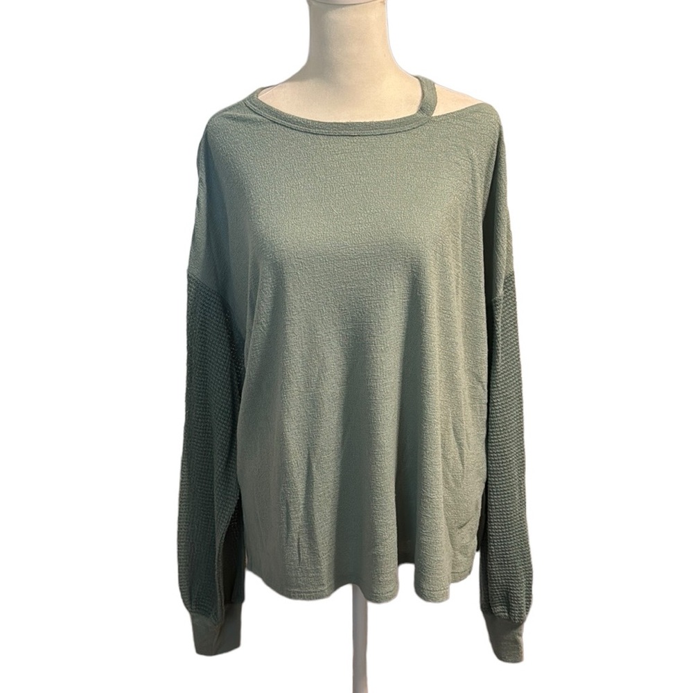 Sage green long sleeve lightweight top with shoulder cut out